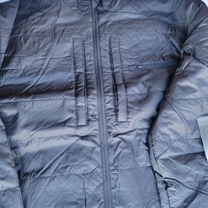 Propper Puff Jackets. Charcoal Gray. Zip closure with magnetic pocket